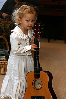 Abbi playing the "target" (guitar)