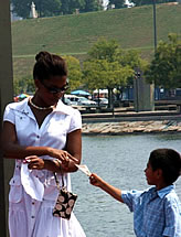 child giving gospel flier
